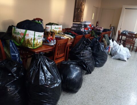Bags of clothing ready for sorting