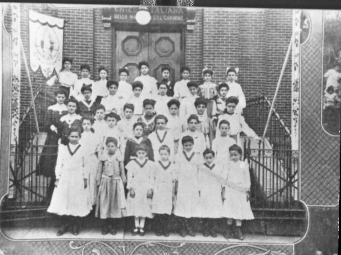 Photo of children in front of a church