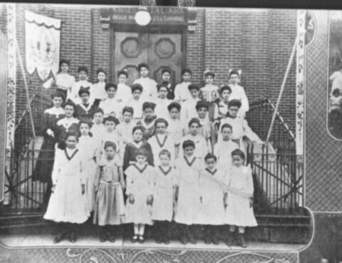 Photo of children in front of a church